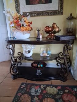 Take entryway brown  wood and c I ear glass