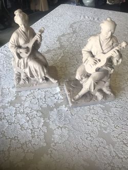 Oriental music statues
