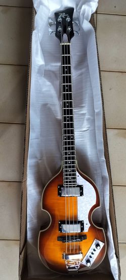 Open box Rogue VB 100 electric violin shaped bass