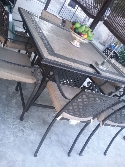 Outside patio table w 8 chairs solid tile