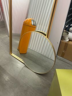 Small round gold mirror