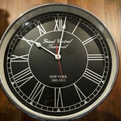  Industrial-style tripod floor clock, TABLE  often featuring a decorative "Grand Central Terminal" New York 1 face. 