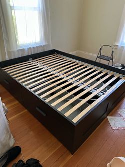 IKEA platform bed with drawers and headboard