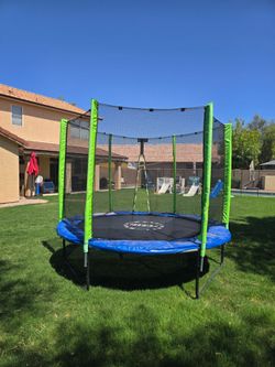 Trampoline - 8 foot diameter, net and ladder included