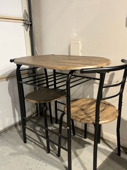 Small Table with chairs & wine rack