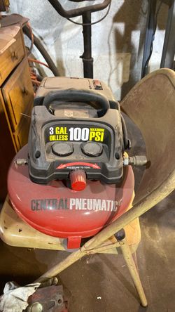 Compressor includes hose and fitting