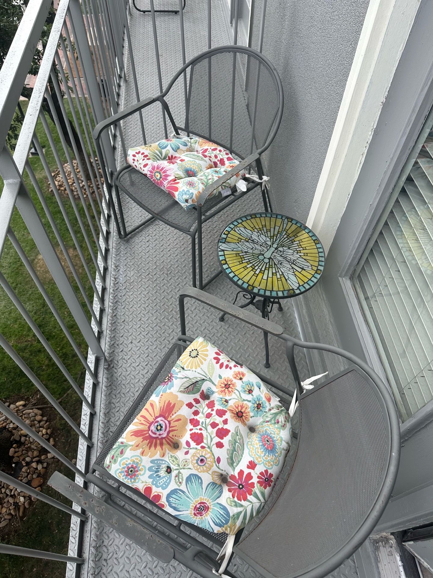 2 Gray Metal Patio Chairs with Floral Cushions