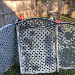 Four pieces of plastic fencing