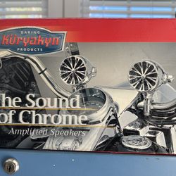Kuryakyn chrome Motorcycle speakers.