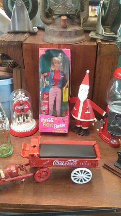 Coca-Cola collection cast iron horse and cart picnic Barbie metal Santa Claus gumball machine and more
