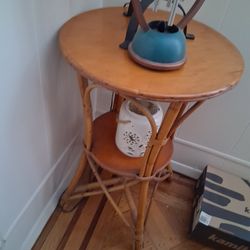 Round rattan side table