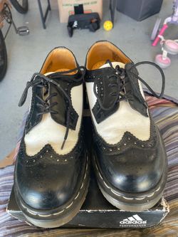 Dr.Martin black and white wingtip shoes size UK5. Fit women’s size 8.