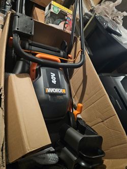 NEW PUSH LAWNMOWER FOR SMALL YARDS....14 IN...CHARGER,  2 BATTERIES AND VACUUM INCLUDED...$ 200