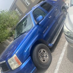 blue 2003 Cadillac Escalade EXT