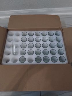 30 shot glasses in a box-open box