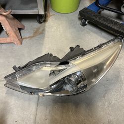 Broken Hyundai Genesis Sedan Headlight 
