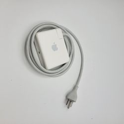 Apple AirPort Express  Wireless Router Extender A1264 with AC extension.
Pre-owned, in good working and cosmetic shape