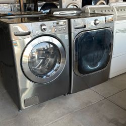 GRAY LG FRONT LOAD GAS SET WITH XL CAPACITY 