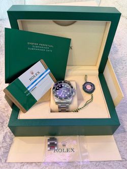 Rolex - Submariner / Date. Box and papers