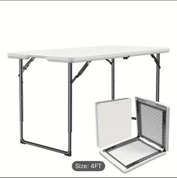 New - foldable table ( 4 feet) ( adjustable height)