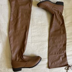 Woman’s High Thigh Boots
