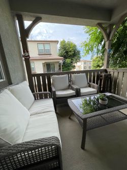 Beautiful balcony set with tables and chairs