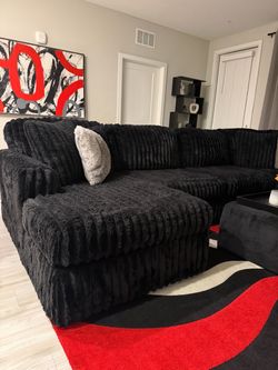 Large luxury black couch