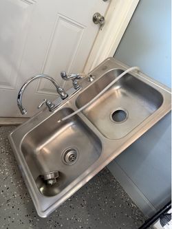 Sink with faucet