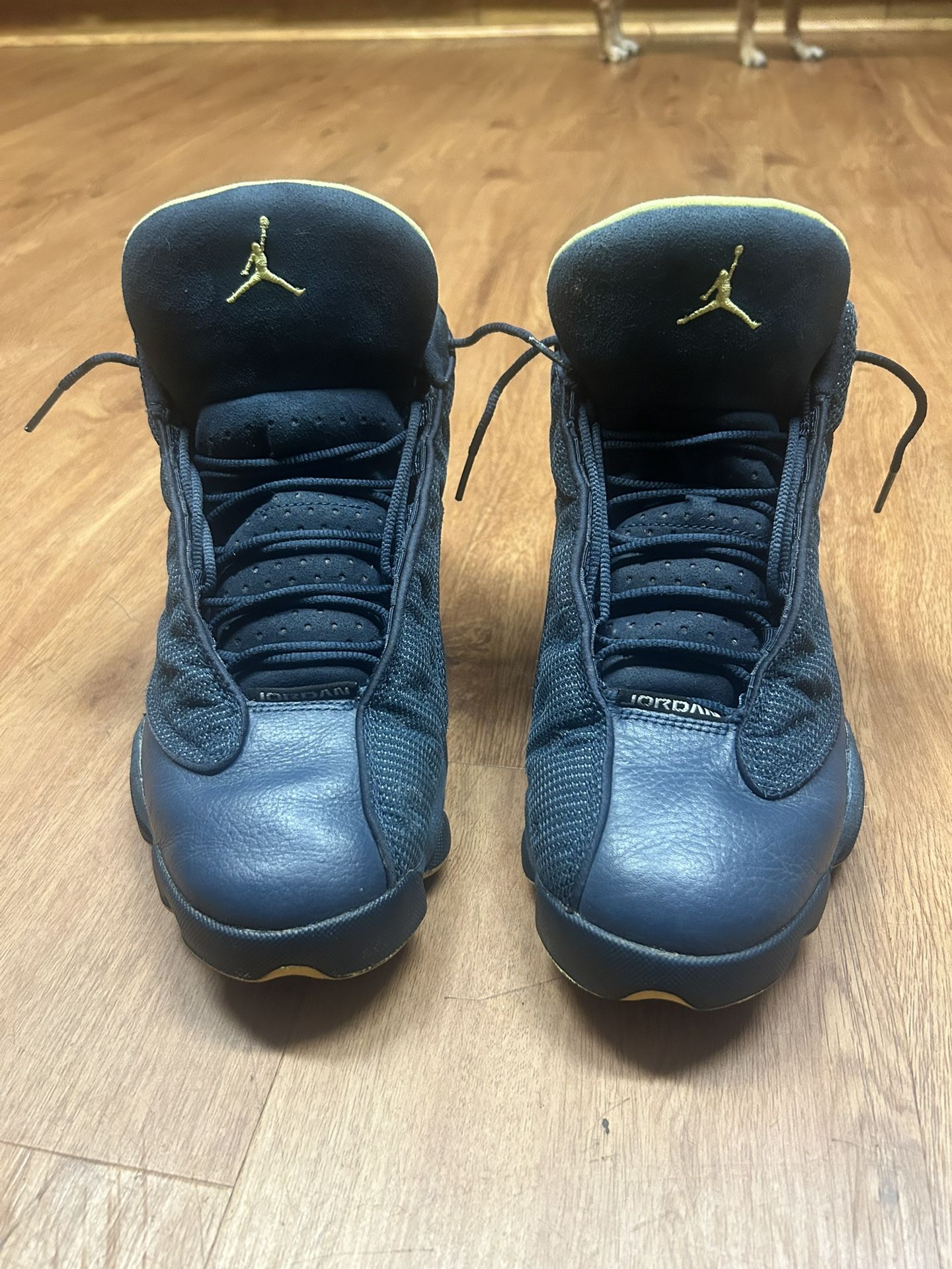 Nike Air Jordan 13 Retro Squadron Blue sneaker with electric yellow accents. Size 10 Men’s