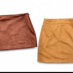 2 Suede Mini Skirts - Forever 21/Mangopop Burgundy suede mini skirt size Small  Orange suede mini skirt size XS Both brand new never used    If you ha