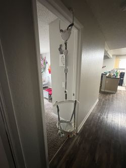 Portable doorway baby jumper
