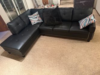 Black louvenia 2 piece faux leather sectional