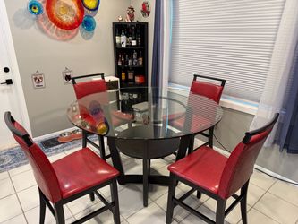 54” Round Glass Bar Height Dining Set with 4 Chairs – Black w Red Chairs – $195 OBO Port St Lucie