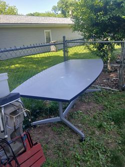 Long Heavy Duty Table with wheels that lock need a Truck to move and help can be used outside or inside