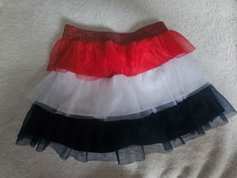 Red, white, and black tutu skirt with glittery waistband size 3
