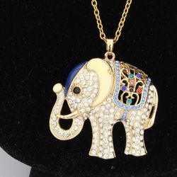 Elephant Pendant with Blue and Multi Color Austrian Crystal in Gold Tone ION-plated 24 inch chain. A little mar from manufacturing see picture