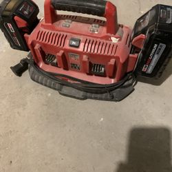 Milwaukee Six Pack Charger + 2 Batteries 