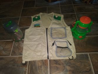 Backyard safari vest and critter jar with lantern.