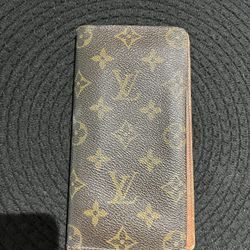 LV wallet/checkbook Holder 