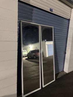Mirrored Sliding Closet Doors with White Frame