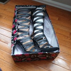 Black knee length high heels