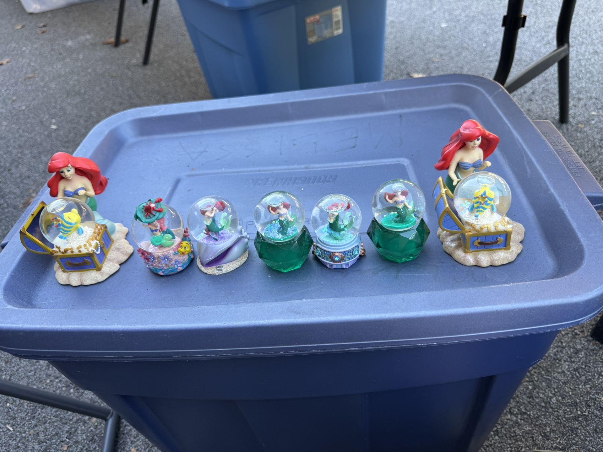 collection of 7 miniature snow globes featuring the Disney character Ariel from The Little Mermaid,