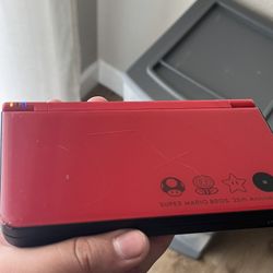super mario bros 25th DSI XL with games loaded on