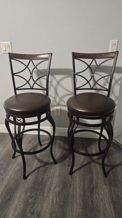 2 brown bar seats