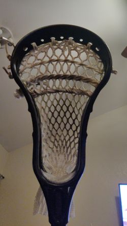 Warrior Evo Pro head on Shortened black Defense shaft. The best D lacrosse stick