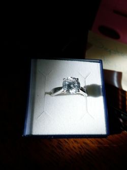 1kt Cubic zirconia in rhodium plates sterling silver.