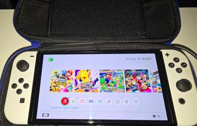 Nintendo Switch OLED White Bundle + Tons of Accessories – $270 OBO