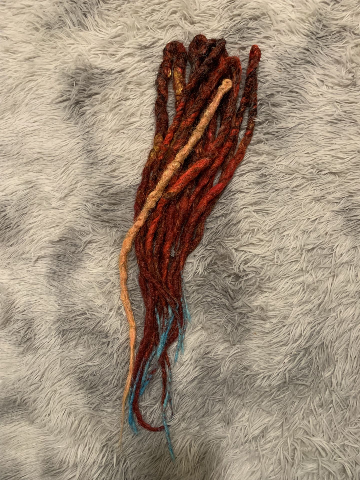 7 double ended red and turquoise synthetic dreadlocks