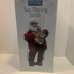 Holiday Home Sax Playing Santa-moves to “Up On The House Top”. Vintage  Excellent condition Santa plays the saxophone and dances! Tested and working. 