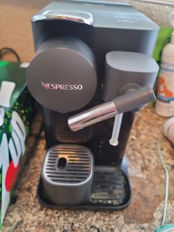 Nespresso  machine by De'Longhi in black
